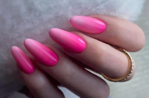 long oval nails with pink ombré design
