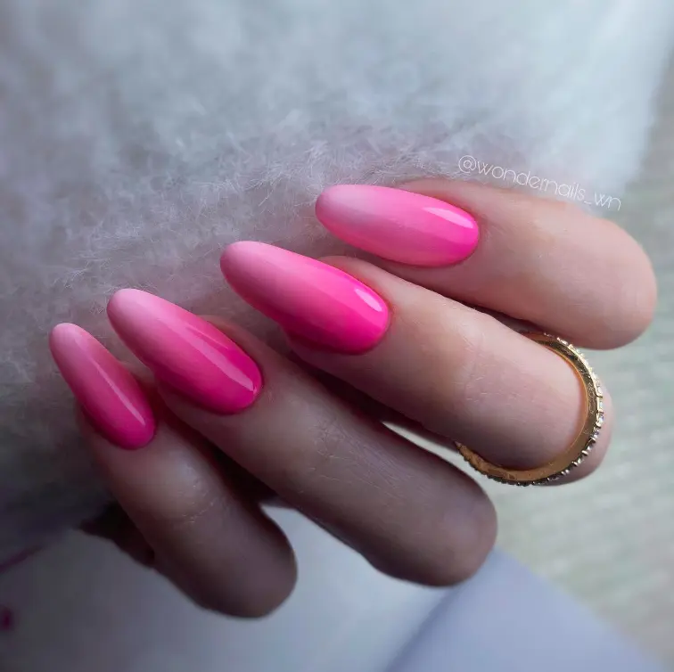 long oval nails with pink ombré design