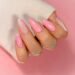 long oval nails with light pink swirls