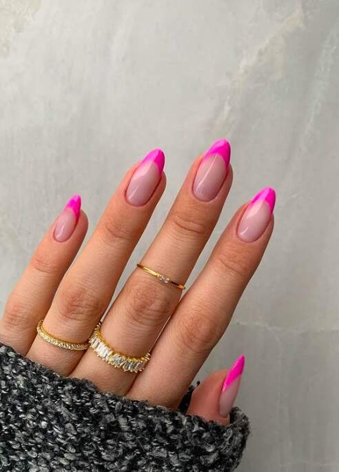 hot pink french tips design on long oval nails