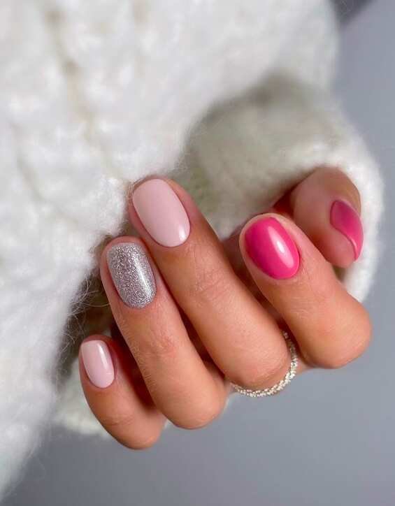 short round nails with hot and light pink and silver polish