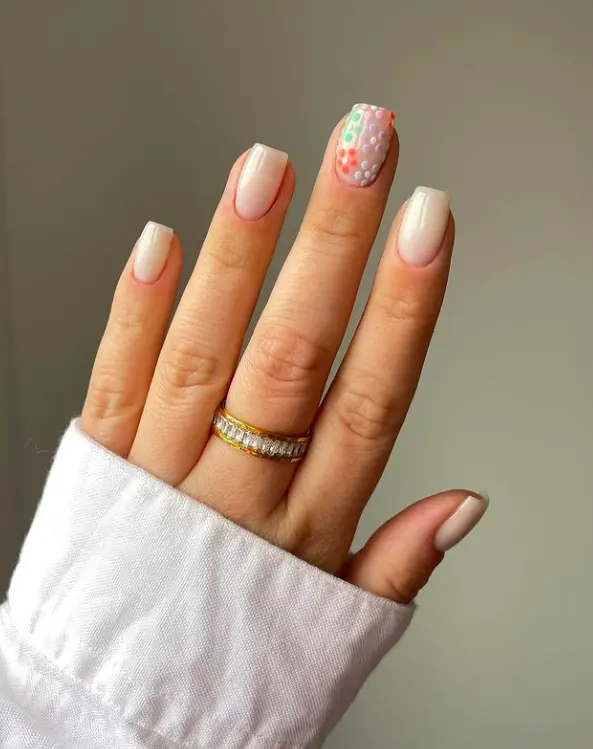 short square nails with easy floral design on middle finger