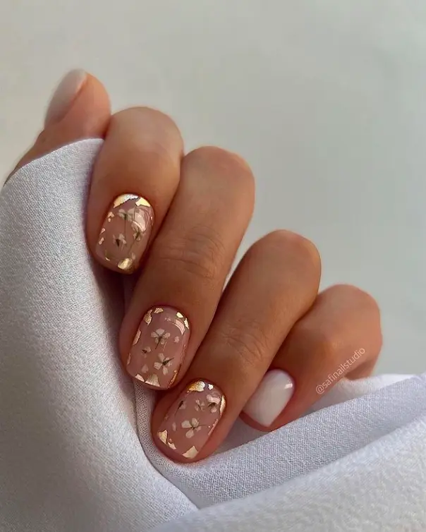 white and gold floral nail art