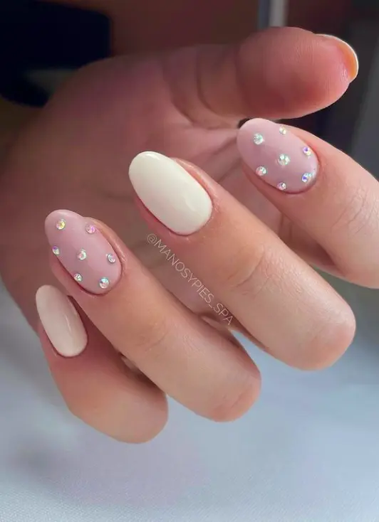 nude and off white with tiny crystals nail design