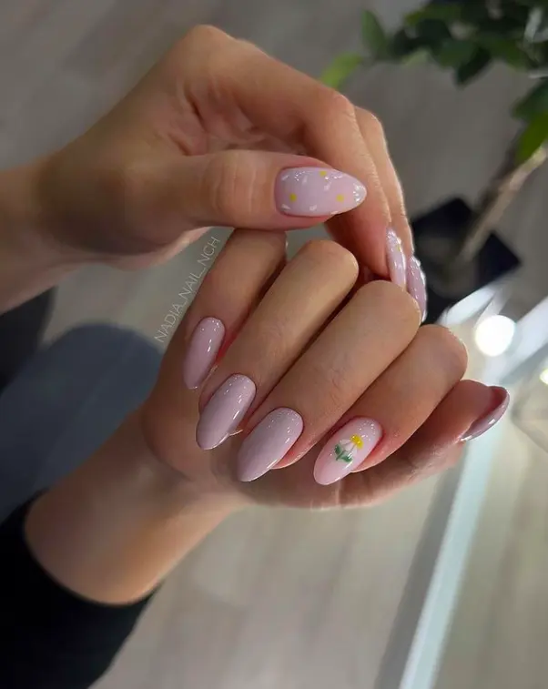 long oval nail with neutral floral design